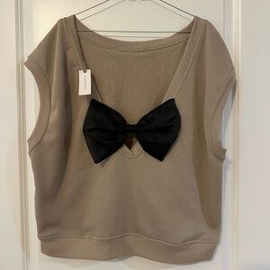 Maeve Tops |  Anthropologie sleeveless sweatshirt with Black Organza Bow Accent
